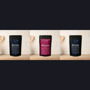 Three tins of Dream Powder sleep supplement for a full month reset